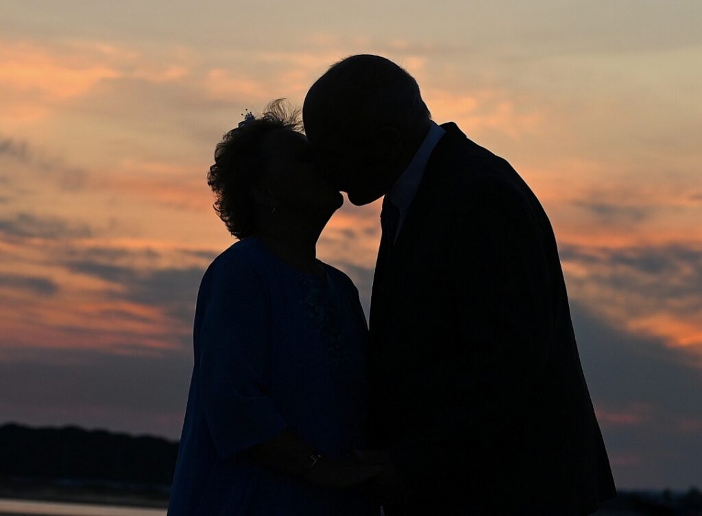 Bride and groom in silhouette